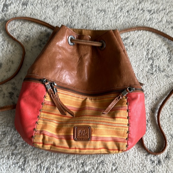 The Sak Drawstring Leather and Fabric Backpack OS